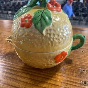 Lemon Shaped Ceramic Juicer with Floral And Clown inside Design